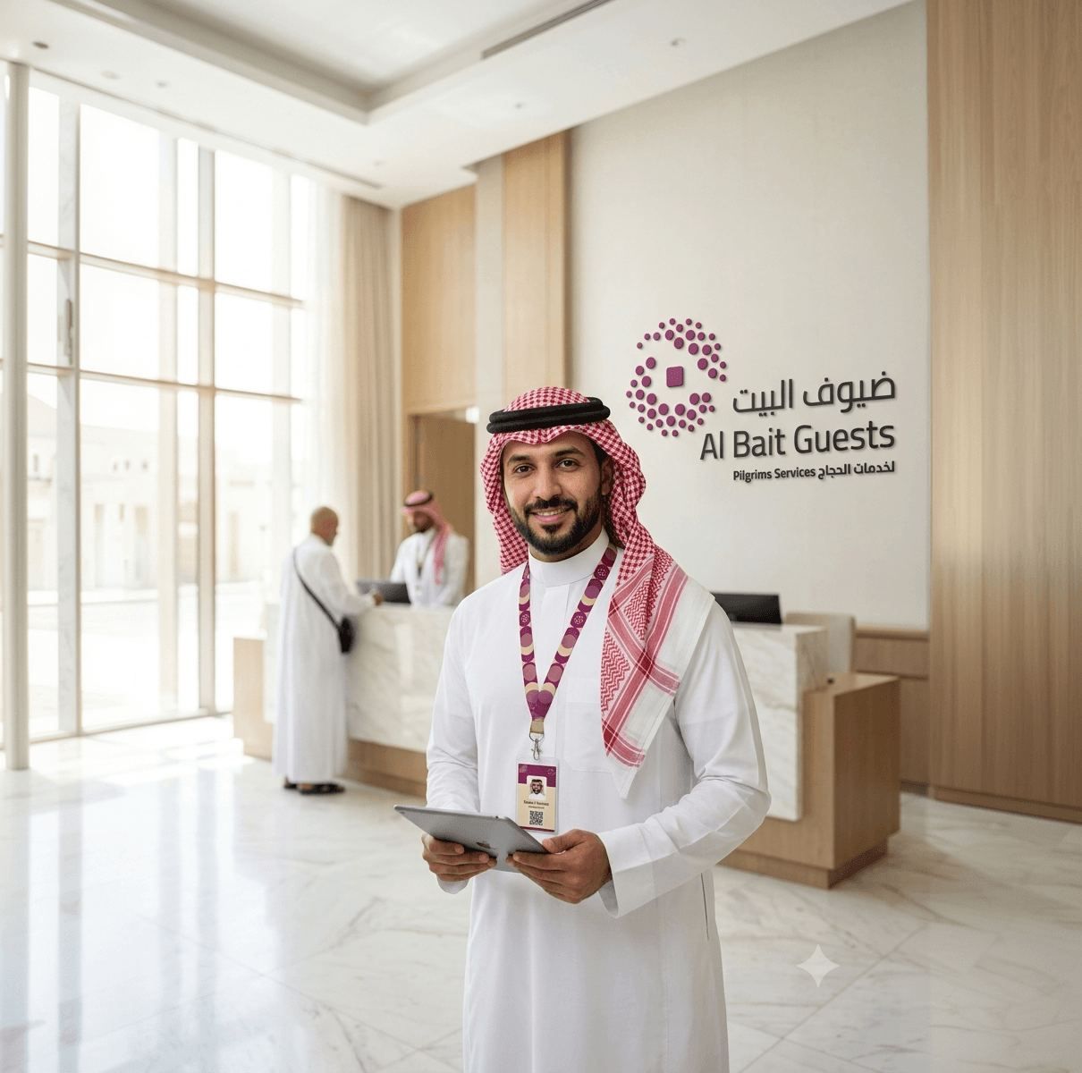 ممثل من ضيوف البيت يحمل جهازاً لوحياً في الاستقبال